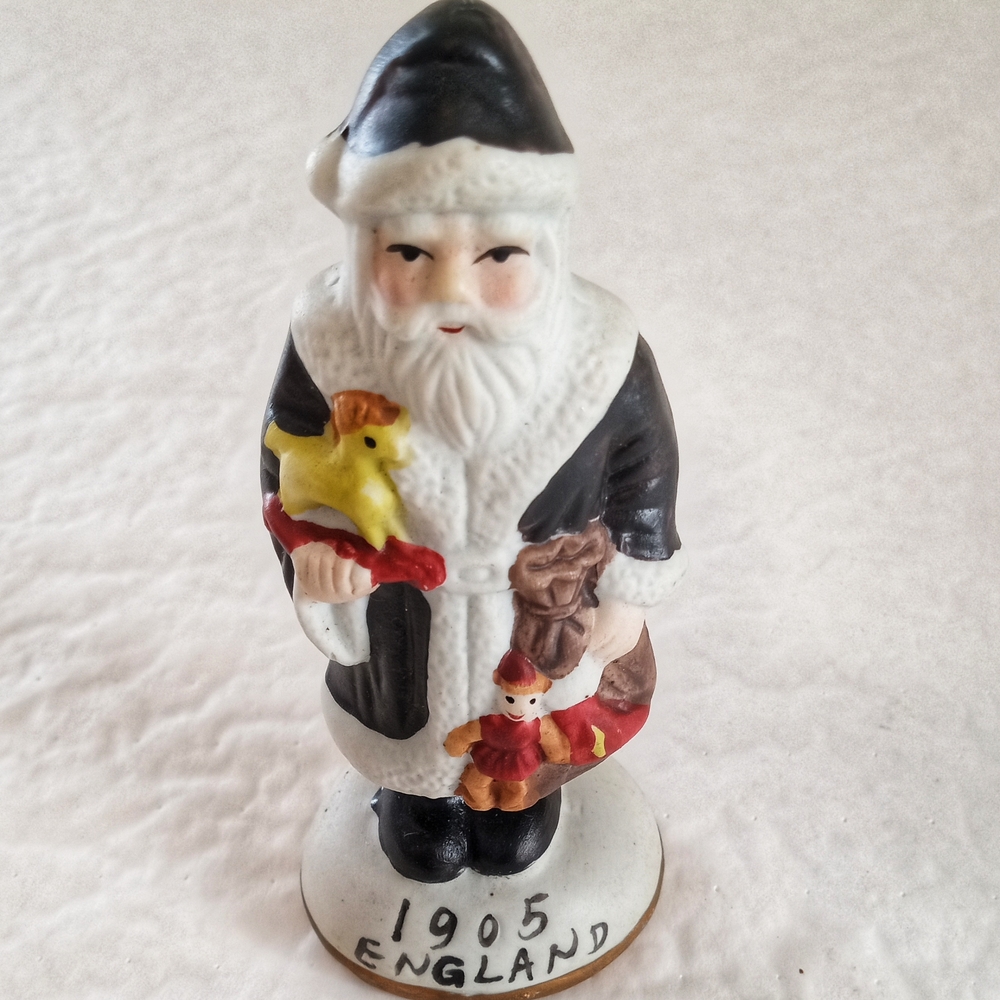 Vintage Santa Claus Figurine - Black, White, and Red